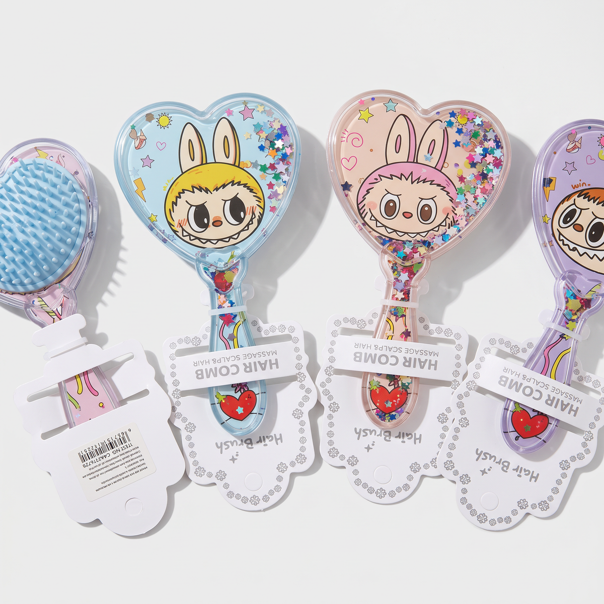Cepillos de pelo en forma de corazón con diseños de personajes